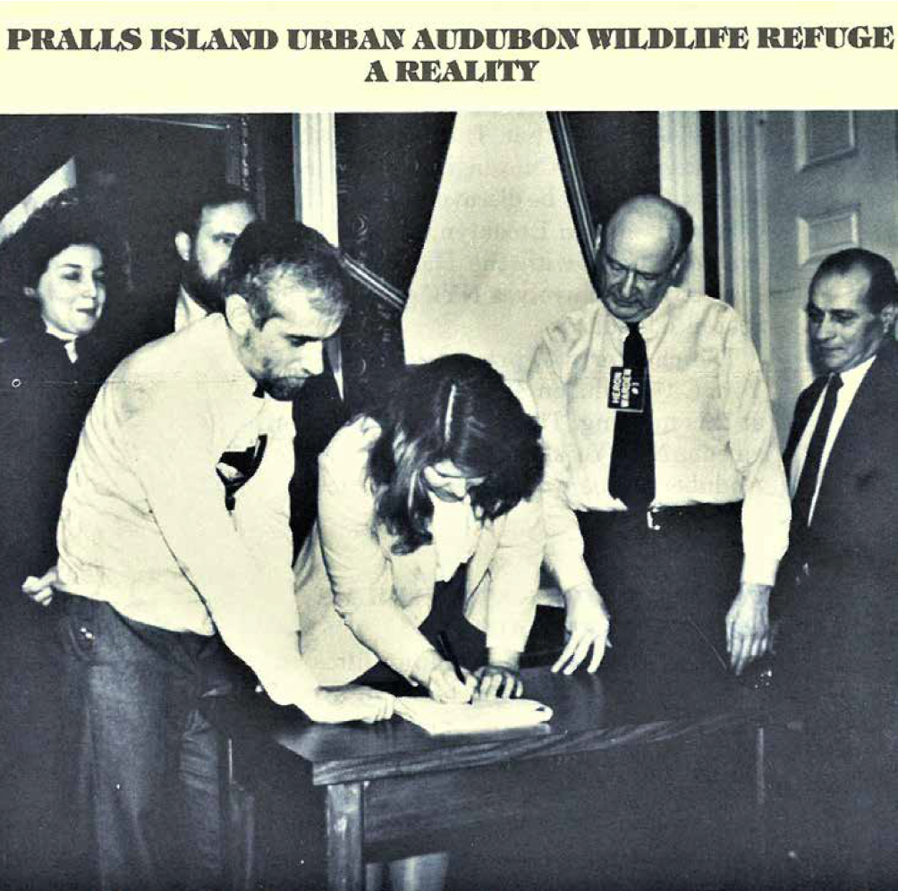 Mayor Edward I. Koch signs a management agreement for Prall’s Island with NYC Parks/NYC Audubon on Thursday, February 21, 1985. Pictured (left to right): past Board Member Peggy Kane, past Board President and Vice President Albert F. Appleton, NYC Parks Commissioner Henry Stern, past Board President and Vice President Bette Brookshire-McGrath, Mayor Edward Koch, and Wally Popolizio. Photo: Mitch Heiberg