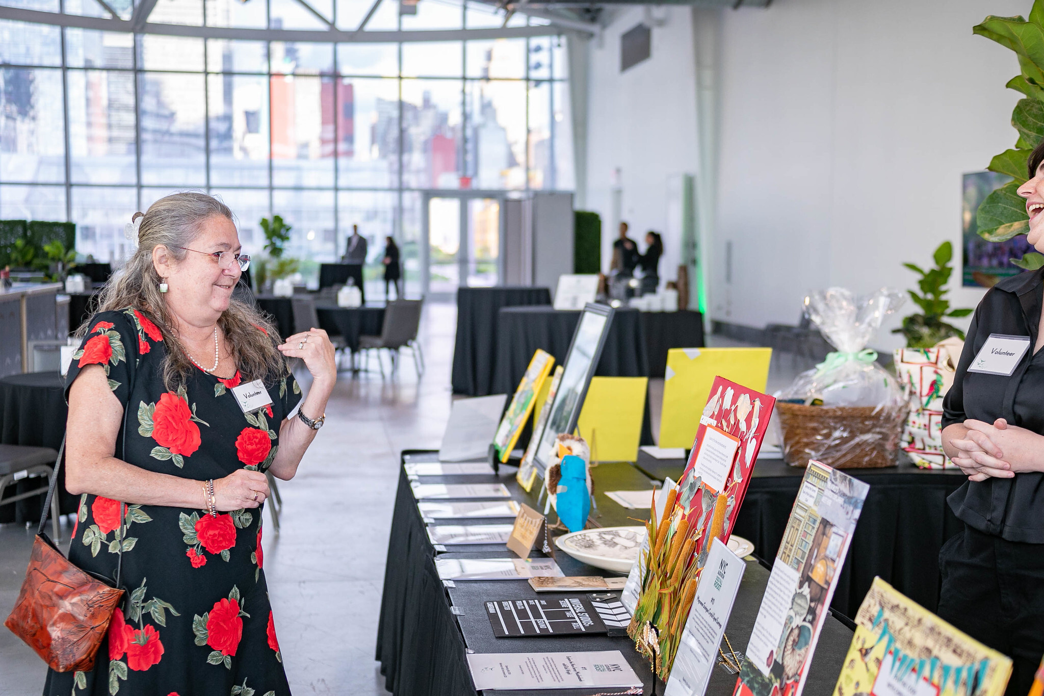 Volunteer Ann Seligman manages the 2022 Fall Roost silent auction. Photo: Cyrus Gonzeles